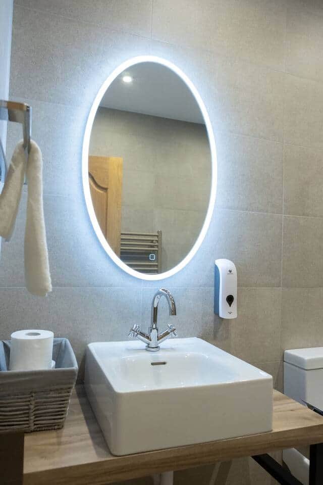 Main bathroom washbasin in Apartment 2