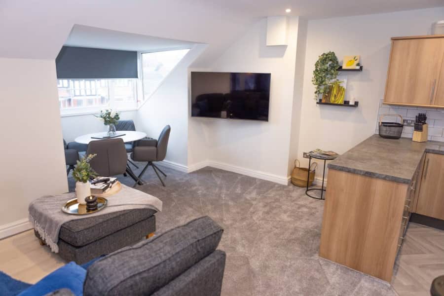 Open-plan kitchen and lounge in Apartment 3